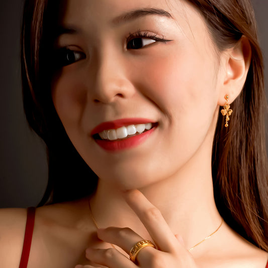 916 Gold Dangling Leaf Earring