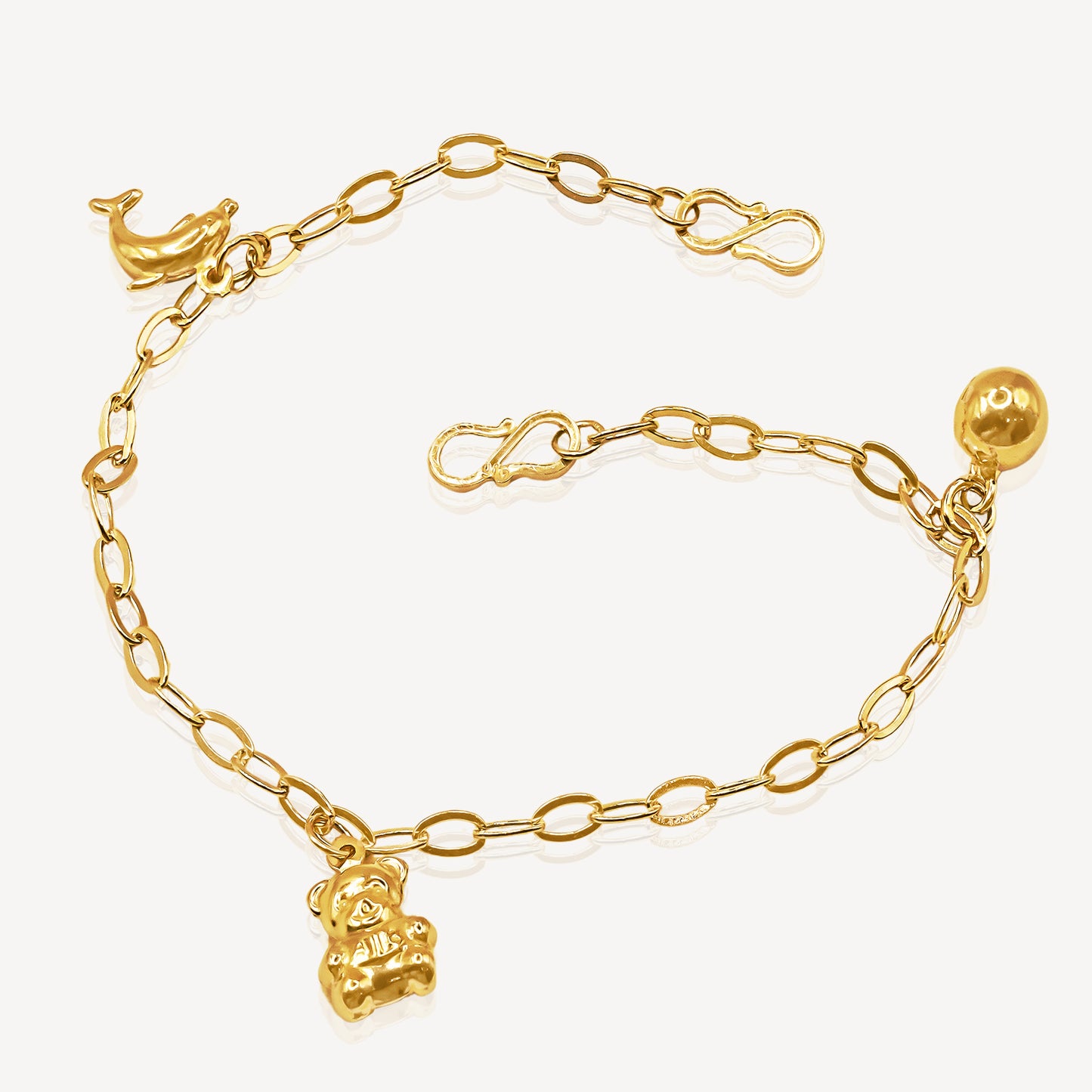 916 Gold Baby Anklet ( Bear , Dolphin, Bell)