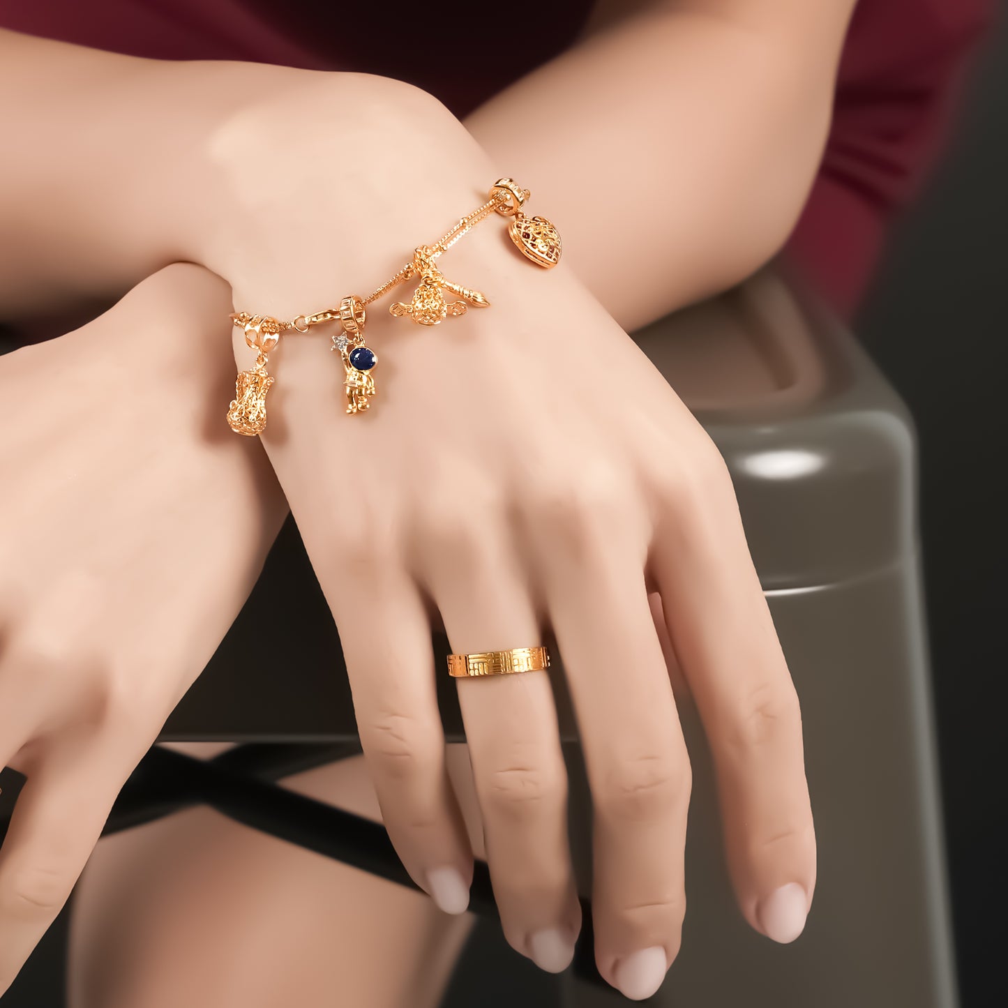 model wear bracelet full of charm top gold shop gold jewellery in singapore