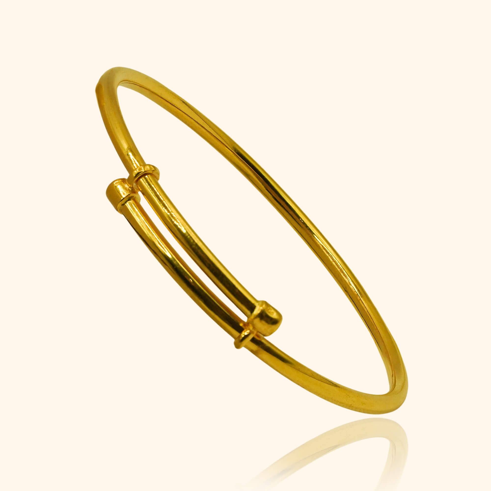 916 gold bangle with a classic baby design from top gold shop singapore