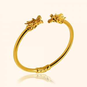 916 gold bangle with a dragon head design from top gold shop